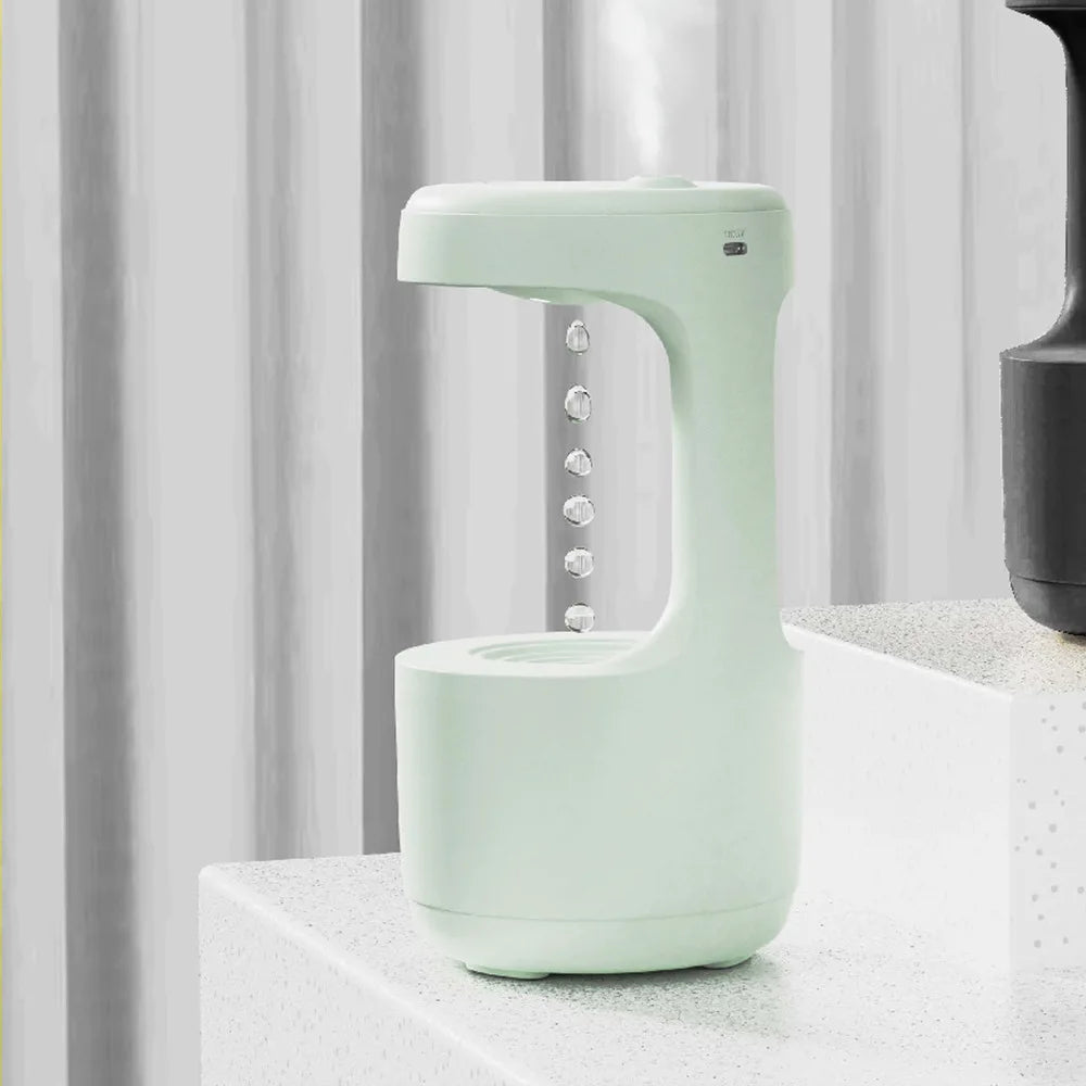 Water Droplet Humidifier with Anti-Gravity Effect and Clock
